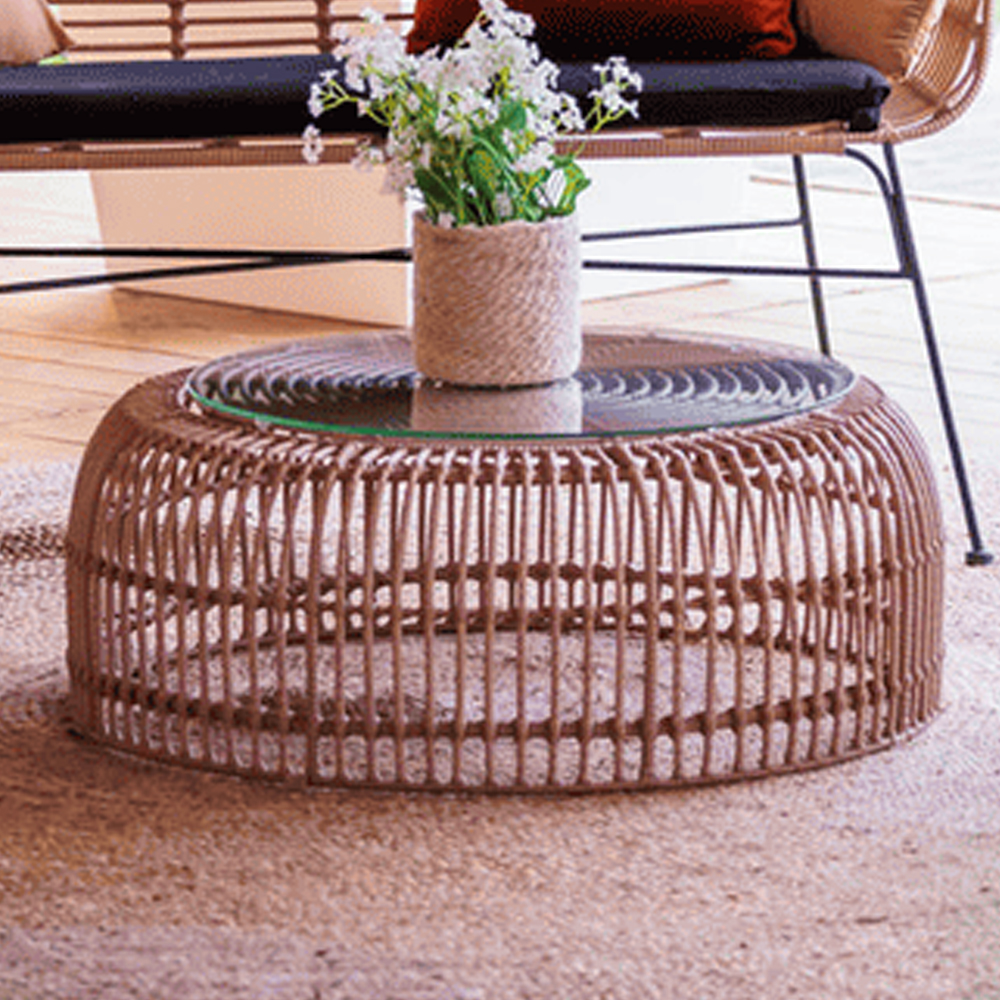 Ponoka Glass Top Outdoor Coffee Table With Rattan Base In Natural